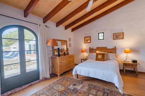 Ένα ή περισσότερα κρεβάτια σε δωμάτιο στο Casa Poupitta - 10 personnes - 5 chambres en suite - piscine