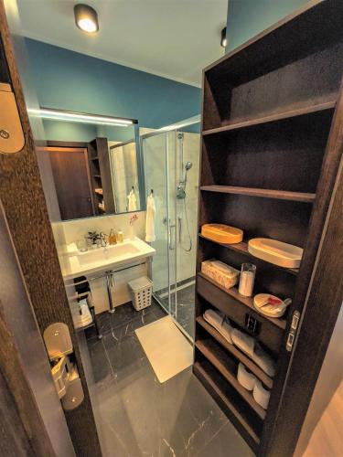 a bathroom with a shower and a sink at Villa Lettonia in Jūrmala