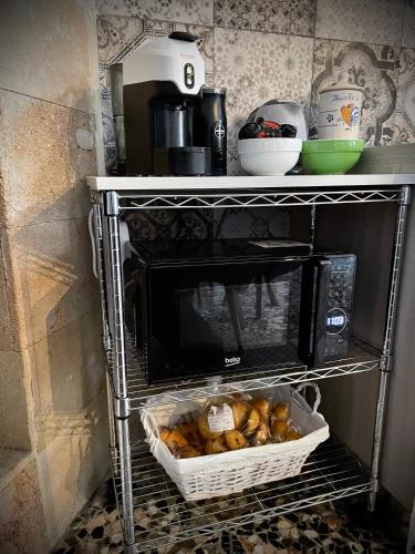 Una cocina o cocineta en L’abete bianco