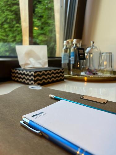 a blue pen sitting on top of a table at Villa Lettonia in Jūrmala