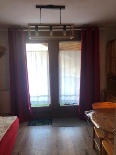 Postel nebo postele na pokoji v ubytování L'enclaves