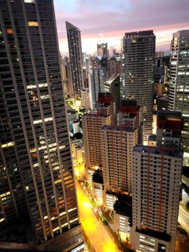 a view of a city skyline with tall buildings at Lady Di Suite in Makati in Manila
