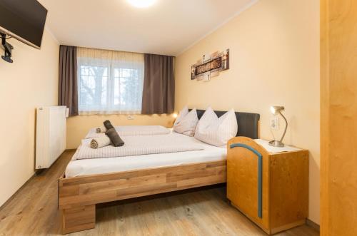 Postel nebo postele na pokoji v ubytování TONI´s APPARTEMENT