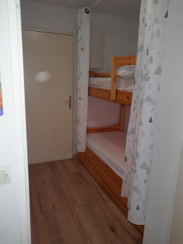 Postel nebo postele na pokoji v ubytování L'enclaves