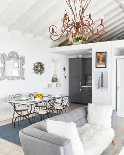 a living room with a couch and a table at Luxury Villa in Kechria 2 in Kechria