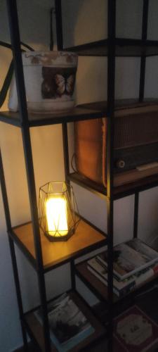 a light on a shelf in a room at Vila Zapis in Pirot