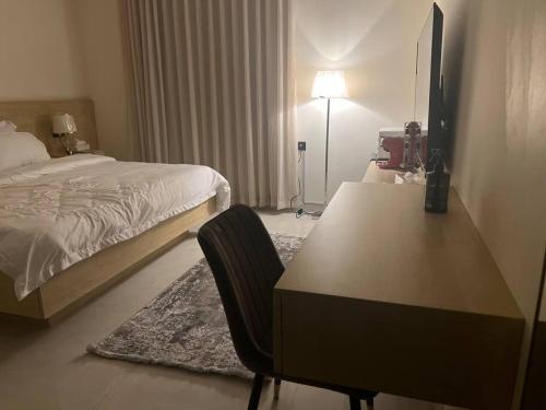 Ein Bett oder Betten in einem Zimmer der Unterkunft Comfy Studio/ Riyadh Boulevard