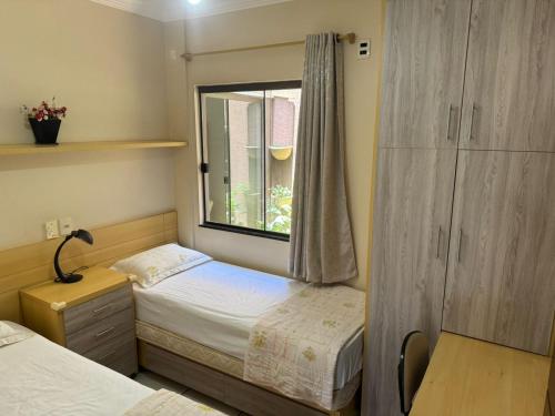 Postel nebo postele na pokoji v ubytování Casa Região do Lago Cascavel-PR