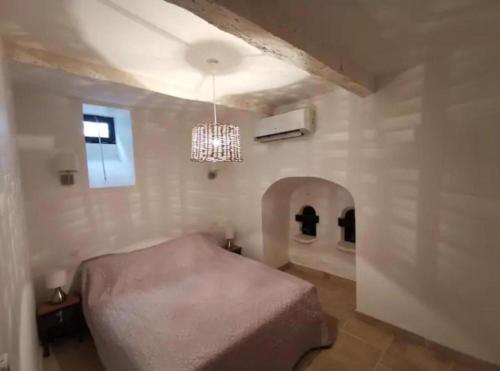 A bed or beds in a room at Villa Napoléon