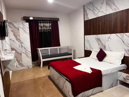 Кровать или кровати в номере Hotel Green