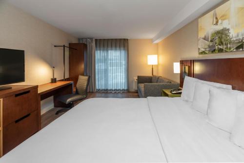 Ένα ή περισσότερα κρεβάτια σε δωμάτιο στο Comfort Inn