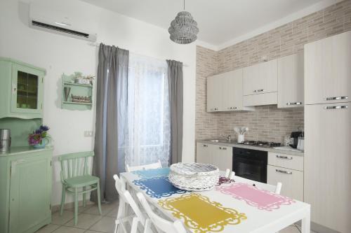 Кухня или мини-кухня в City Pompei Accommodations
