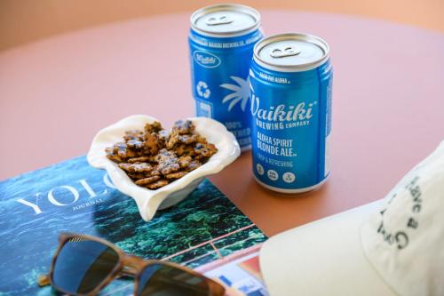 a can of nutella next to a can of soda at The Ambassador of Waikiki, Tapestry Collection by Hilton in Honolulu