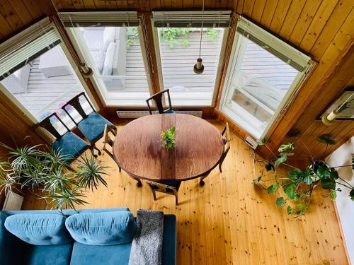 an overhead view of a living room with a table and a couch at Blueberry Villa at Saimaa Lakeside in Taipalsaari
