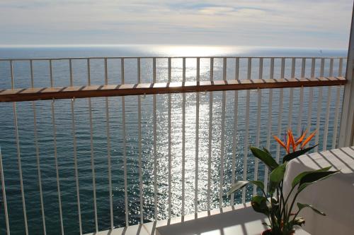 a view of the ocean from the balcony of a condo at Apartamento Torre Alacant in Alicante
