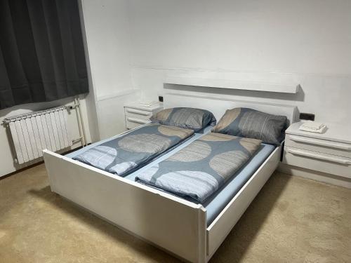 Ένα ή περισσότερα κρεβάτια σε δωμάτιο στο OH 4