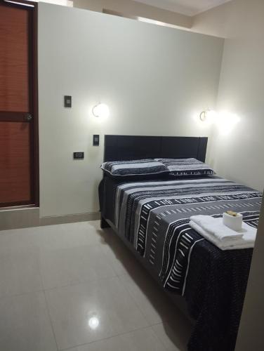 Katil atau katil-katil dalam bilik di Hotel Amazon deluxe