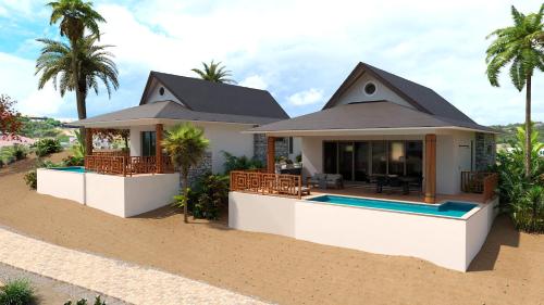 a house on the beach with a swimming pool at Blue Bay Curaçao Golf & Beach Resort in Willemstad