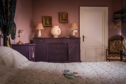 Ένα ή περισσότερα κρεβάτια σε δωμάτιο στο Sicilia Encantada