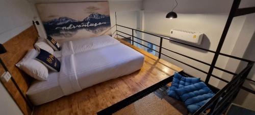 Ένα ή περισσότερα κρεβάτια σε δωμάτιο στο ชวนไดอารี่ Chuan Diary