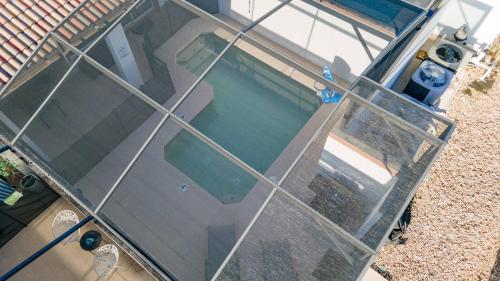 an overhead view of a house with a swimming pool at Family 4BR w Private Pool near Disney Parks in Kissimmee