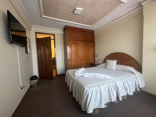 Postel nebo postele na pokoji v ubytování Hotel V I D GALAX Resort