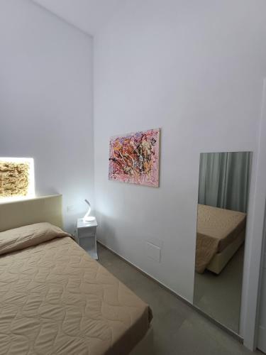 Postel nebo postele na pokoji v ubytování Falìkrjda Suite & Rooms