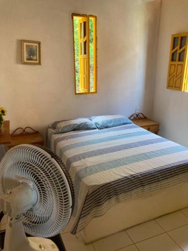 Voodi või voodid majutusasutuse Casa da Praia - Ilha de Maria Guarda toas