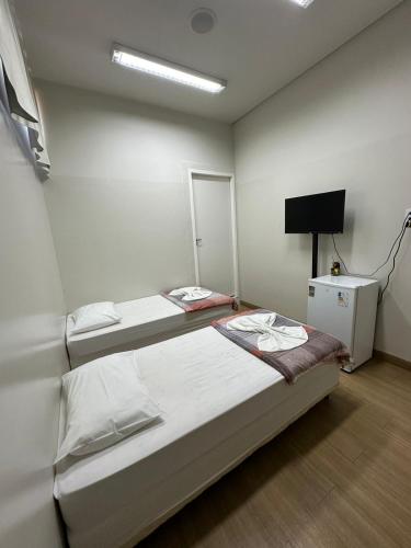 Katil atau katil-katil dalam bilik di Infinit Hotel Flats