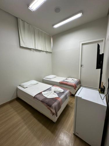 Katil atau katil-katil dalam bilik di Infinit Hotel Flats