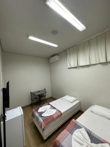 Katil atau katil-katil dalam bilik di Infinit Hotel Flats