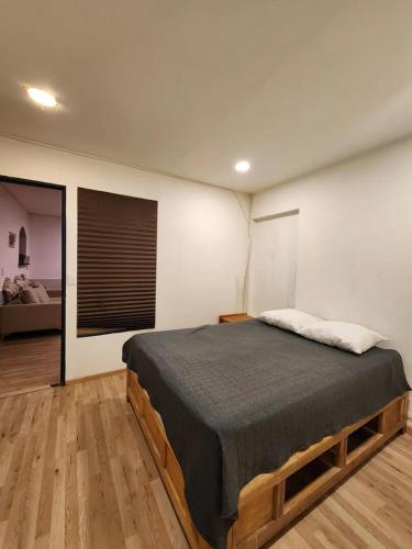 Posteľ alebo postele v izbe v ubytovaní Yachanapa Ñan Siete cuartones 1
