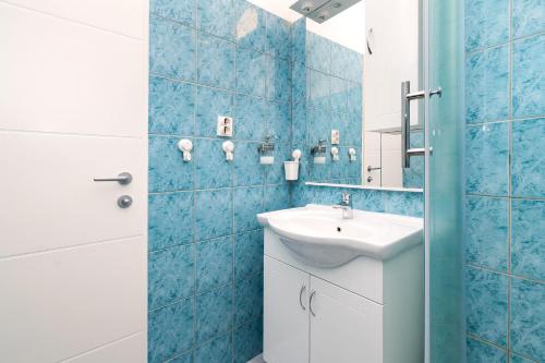 Koupelna v ubytování Apartments Miljenka