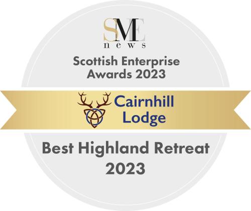 a logo for the best highland retreat at Cairnhill Lodge - Award-Winning Luxury Highland Retreat in Blairgowrie