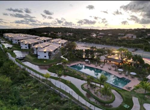 an aerial view of a resort with a swimming pool at Vila do Lago, Praia do Forte in Mata de Sao Joao