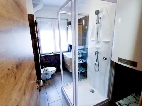 a bathroom with a shower and a toilet at Apartment in Fohnsdorf near Ski Slopes in Fohnsdorf
