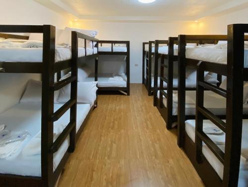 a group of bunk beds in a room at Funtasea Hotel and Beach Resort in Iba