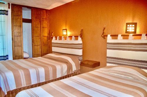 Postel nebo postele na pokoji v ubytování Posada Verona