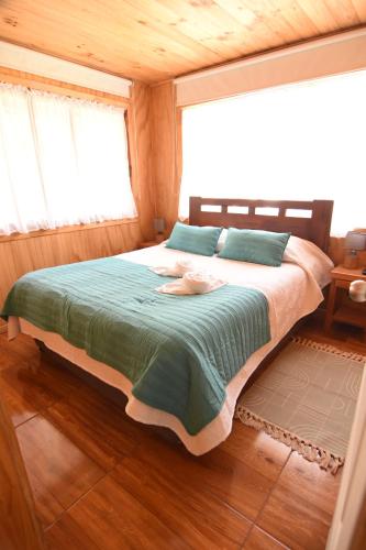 Postel nebo postele na pokoji v ubytování Departamentos Nayentao