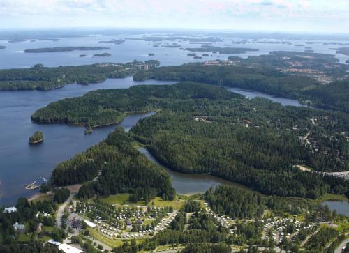 an aerial view of the islands in a lake at Rauhalahti Holiday Cottages in Kuopio