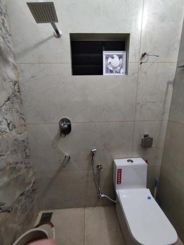Ένα μπάνιο στο Alam Home Stay