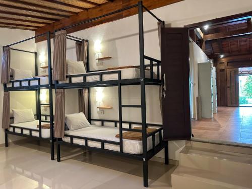 Una cama o camas en una habitación de In Da Lodge