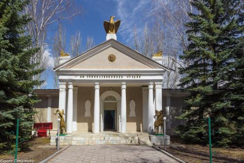 a building with a statue on top of it at Кереге-Таш in Karakol