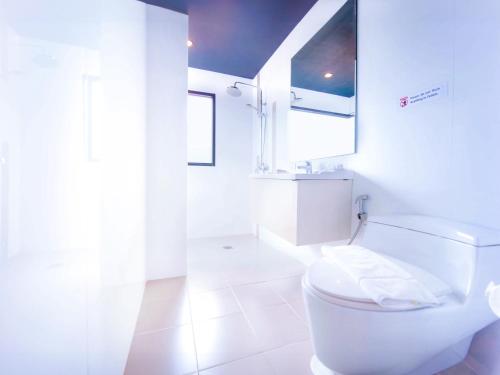 Ένα μπάνιο στο Phoenix Grand Patong