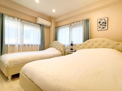 Кровать или кровати в номере Dolce Shibuya