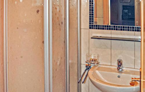 a bathroom with a toilet and a sink at Stunning Apartment In Kappl With 2 Bedrooms And Wifi in Kappl