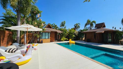 a swimming pool with a inflatable poolvisor at R1 Resort Rajapruek Chiangmai in Chiang Mai