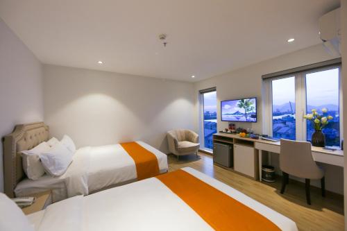 Katil atau katil-katil dalam bilik di RHM Luxury Hotel And Suite