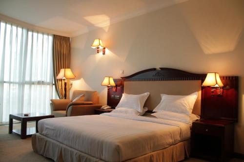 Llit o llits en una habitació de Debredamo Hotel