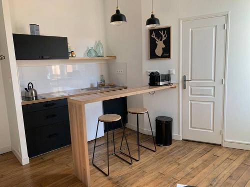 Køkken eller tekøkken på Studio Cosy à 12 min à pieds de la Gare